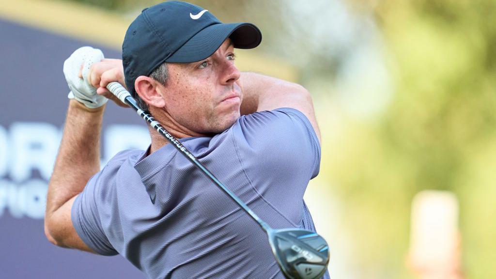McIlroy in 3-way tie, nears Race for Dubai title McIlroy Enters Contention for Dubai Title