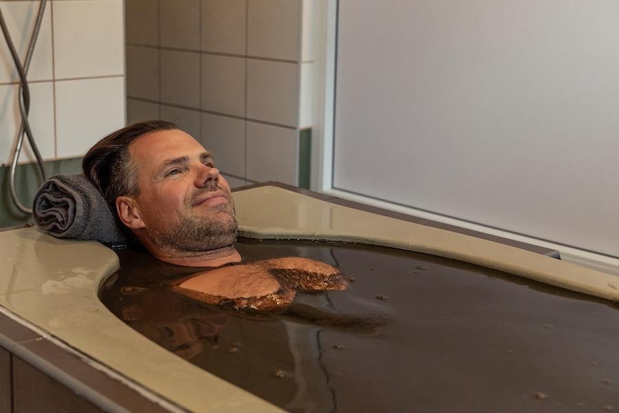 Here’s a more engaging title for your article: **"Rejuvenate Your Spirit: The Transformative Power of a Therapeutic Treatment Bath with Kaley Cuoco, Chris Messina, and Tom Bateman! 🛁✨ #BasedOnATrueStory"** therapeutic treatment bath