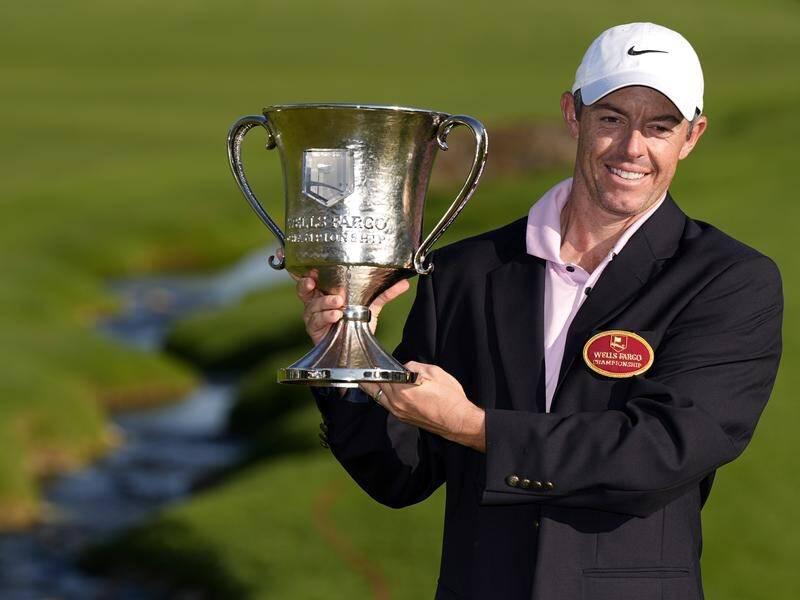 Rory closes with 65, wins record 4th Wells Fargo
