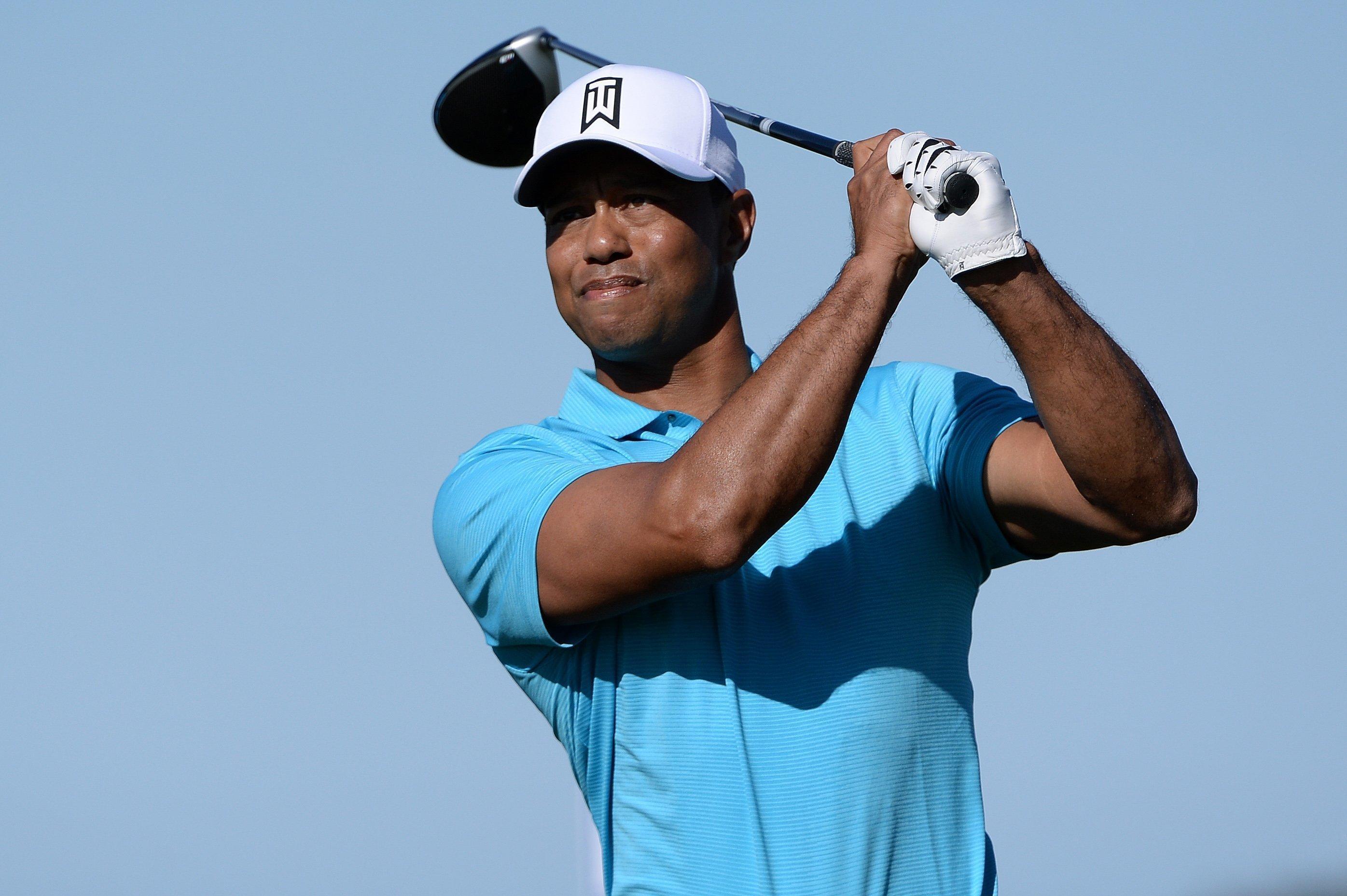 Here are teh most relevant keywords‌ extracted from ‍the article heading:

Tiger⁤ Woods